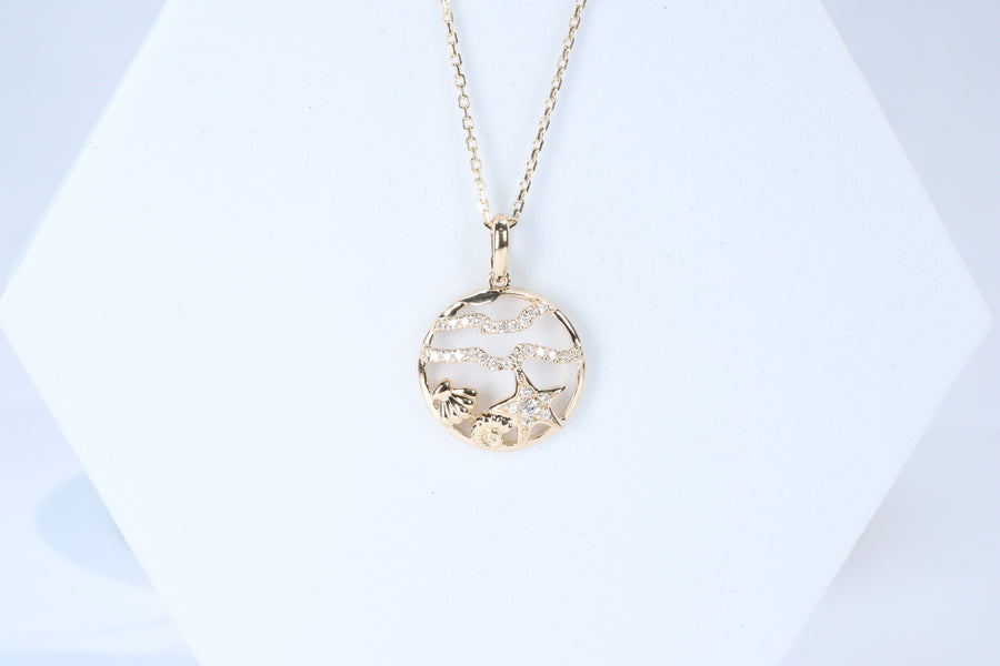 Smithsonian Museum collection by G&G features a serene under water life Pendant in 14K Yellow gold and Diamond for exclusive everyday look
